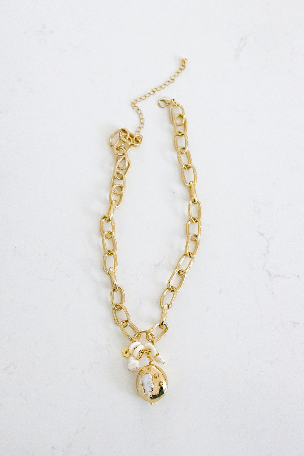 Pearl architectural pendant necklace