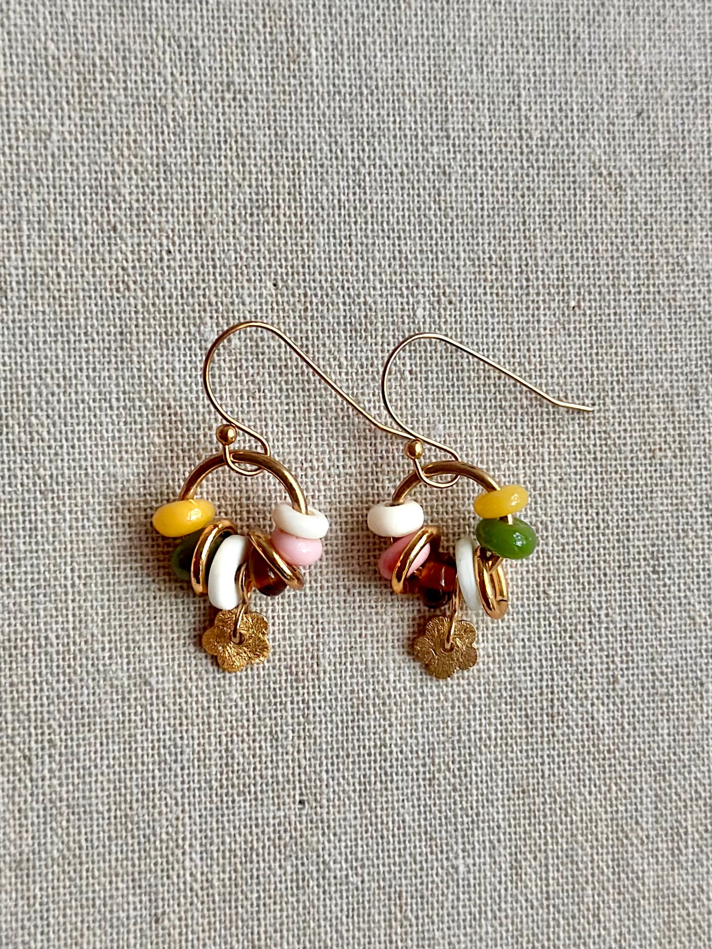 Daisy earrings in autumnal tones