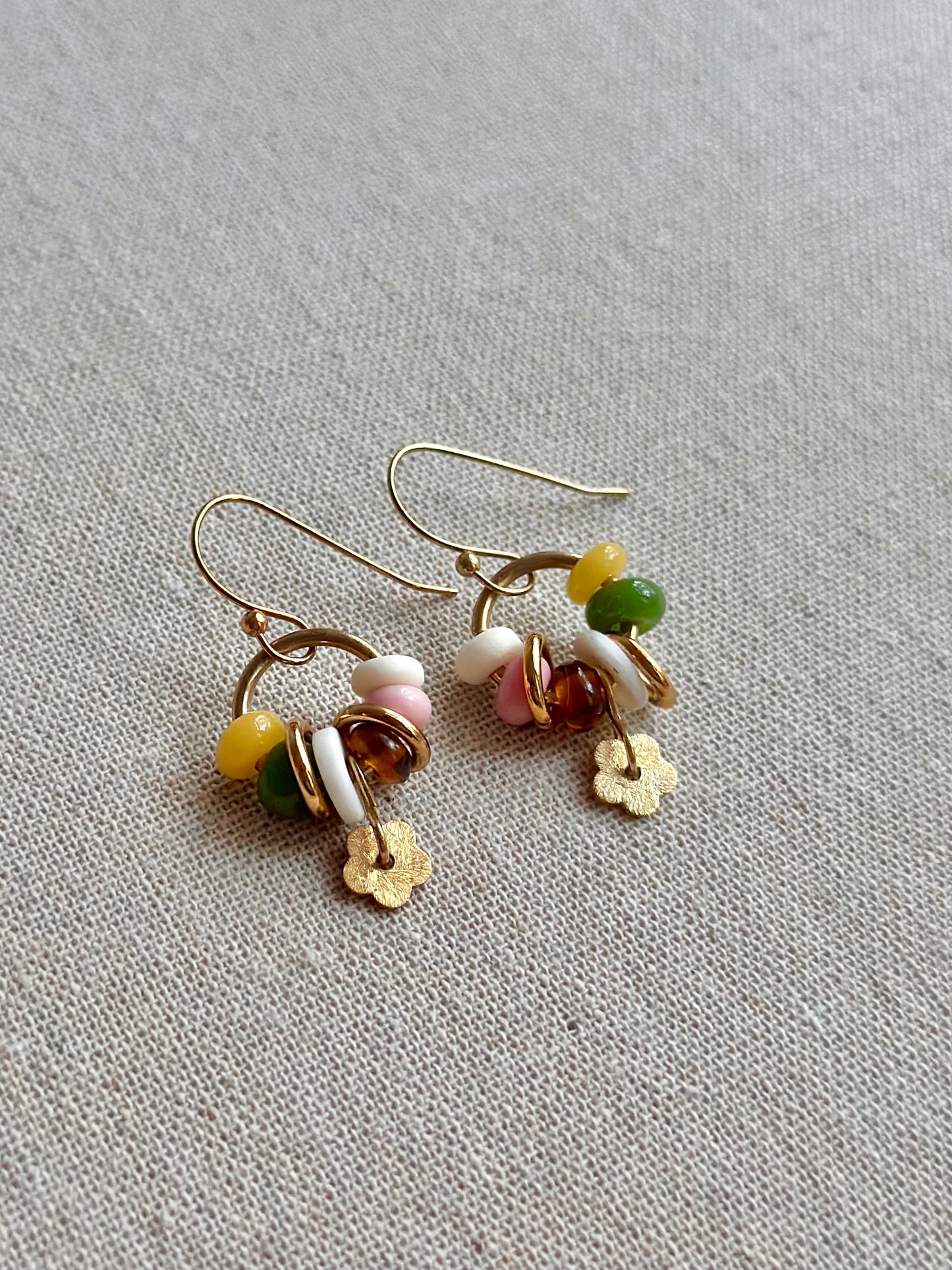Daisy earrings in autumnal tones