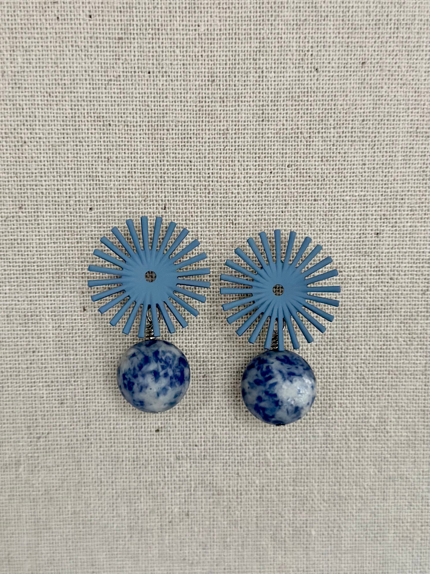 Light blue starburst earrings